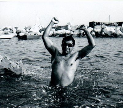 Historical photograph of a marathon swimmer in open water